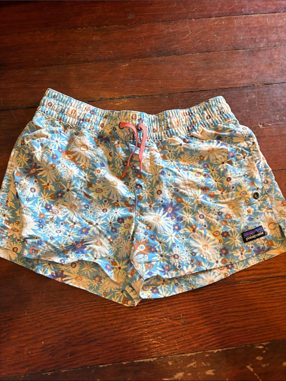 Patagonia Light Blue Floral Kids Swim Shorts with Pink Drawcord